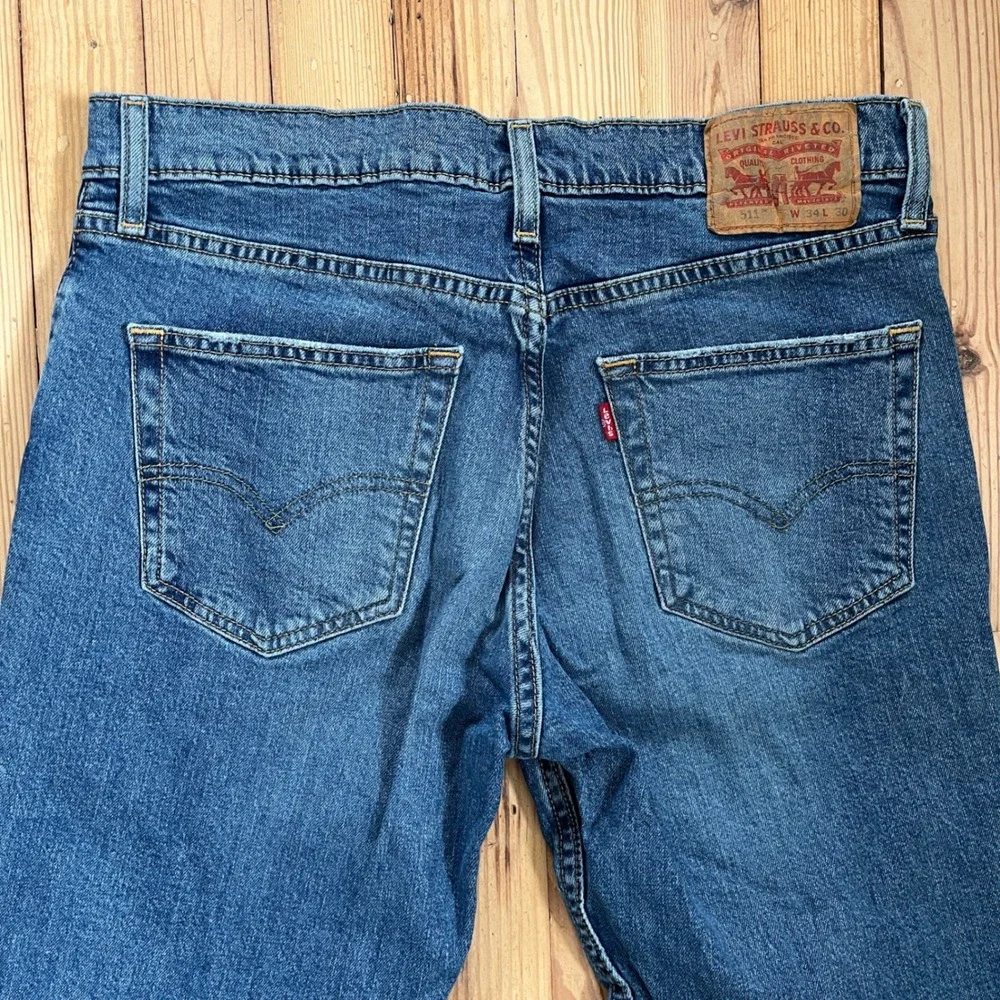 Levi Strauss 511‎ Slim Fit Jeans Mens 34x30 Medium Wash Blue Distressed Ripped